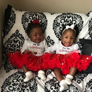 A red an white with gold dots on the tutu